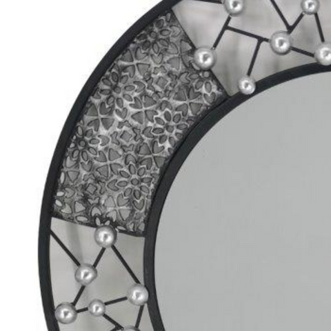 Round black and silver metal mirror